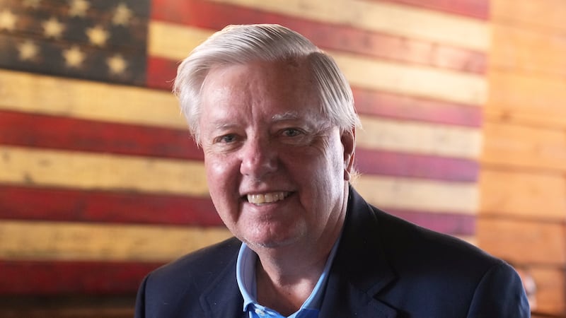 FILE - Sen. Lindsey Graham, R-S.C., arrives at a campaign event on Aug. 19, 2025, at Holt...