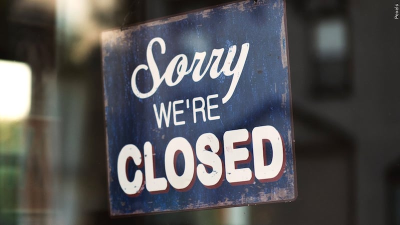 File photo of restaurant closed sign.