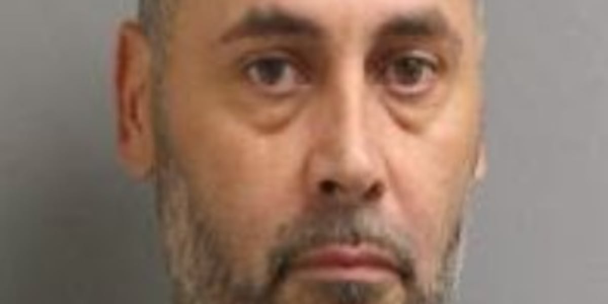 Wanted suspect found in suspicious white van parked in Enfield lot, police say