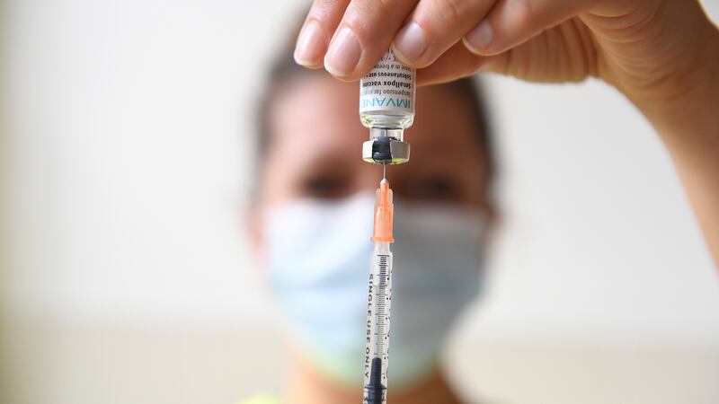 FILE - A health professional prepares a dose of a Monkeypox vaccine at the Edison municipal...