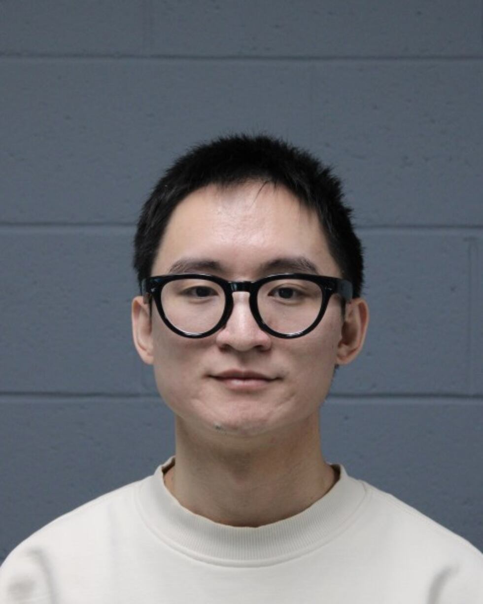 Xiallong Wang was charged with larceny and telephone fraud for a cryptocurrency scam that cost...