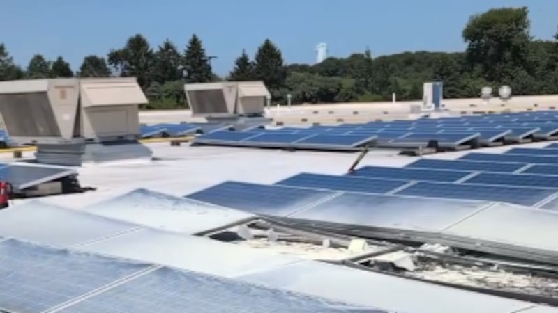Several solar panels caught fire on the roof of the Manchester Walmart on Buckland Hills...