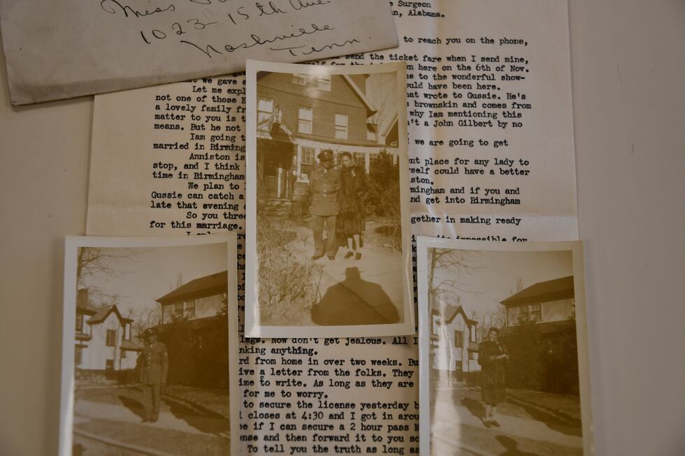 Pictures of William Raymond Whittaker and his wife, Jane Dean Whittaker, are on top of letters...
