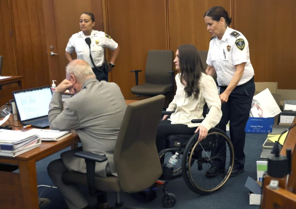 Lindsay Clancy enters the courtroom after a short break in her murder trial at Plymouth...