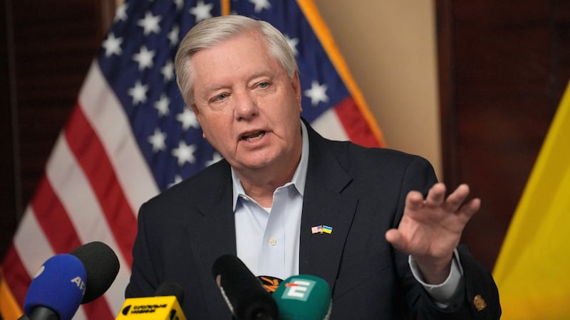 FILE - U.S. Sen. Lindsey Graham, R-S.C., gestures as he speaks to the media in Kyiv, Ukraine,...
