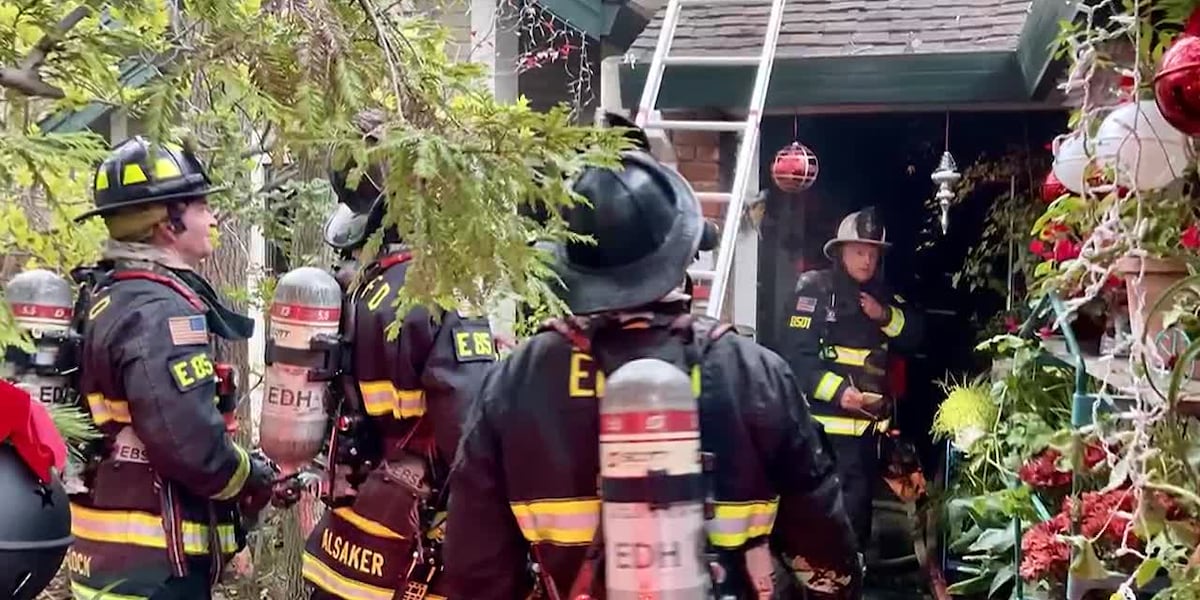 Off-duty firefighters help rescue woman trapped in house fire