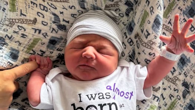 Carlo Corsini Doyle was delivered by his father, Archie, while the family was on their way to...