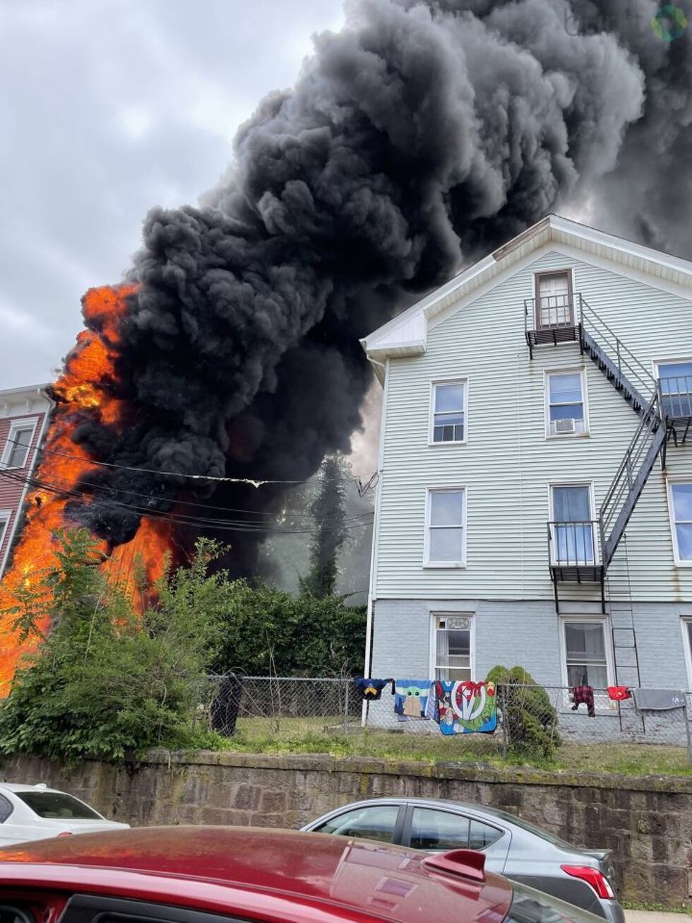 Crews battle fire in Meriden