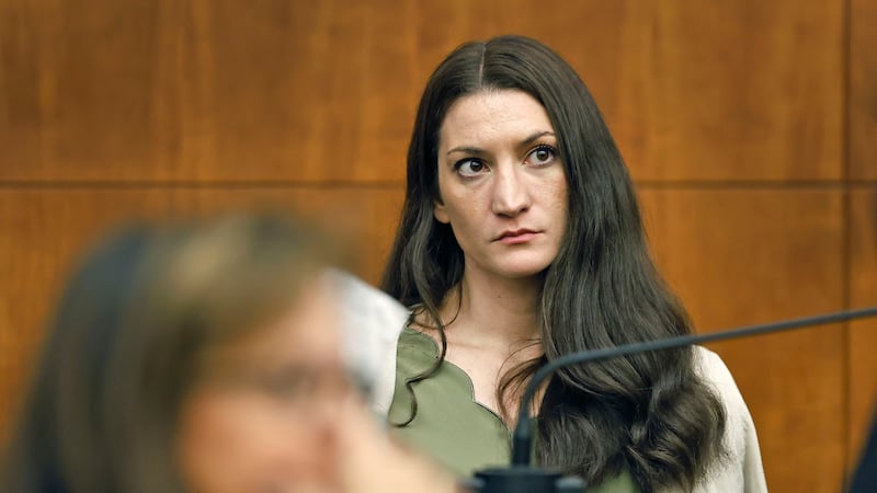 Lindsay Clancy waits for the judge to call a prospective jury member into court in her murder...