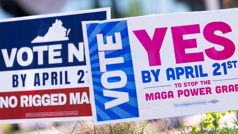 Signs are seen outside Fairfax Government Center during the Virginia redistricting referendum,...
